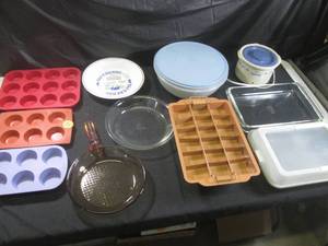 lot 164 image: (G-1) Assorted Kitchen - Rival Crock-ette, Glass and Metal Pyrex, Large Tupperware Bowl, Copper Brownie Pan, Glass Fry Pan, Sylicone Muffin Trays and Blueberry Pie Dish