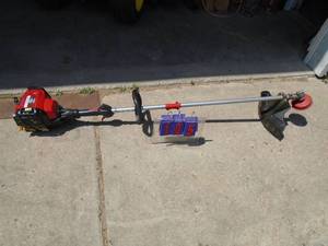 Troy Bilt 4 cycle weed trimmer. Lightly used. Tested & works. As shown.