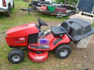 Toro wheelhorse 1238 rider with bagger system. Used condition. Tested & works. As shown. THIS ITEM HAS A RESERVE.