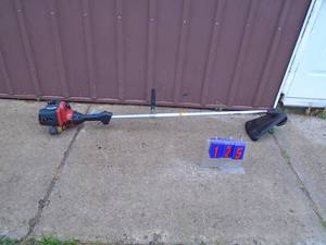 Homelite 2 cycle weed trimmer. Used condition. Tested & works. As shown.