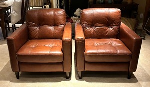 lot 17 image: Two Charming Leather Chairs with Ottomans from Schneidermans Furniture