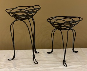 lot 130 image: Two Decorative Metal Candle Holders