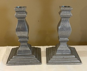 lot 157 image: Three  Pewter Candle Holders