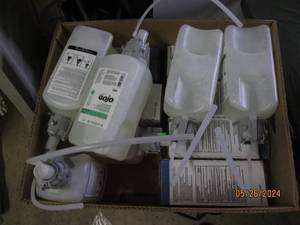 box of gojo foam soap and purell hand sanitizer