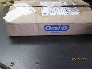 case of 144 oral B satin floss...