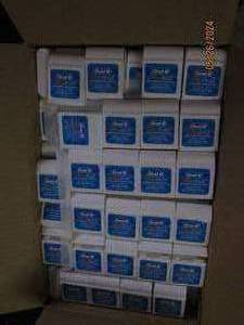 case of 144 oral B ultra floss...