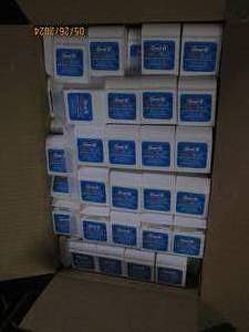 case of 144 oral B ultra floss...
