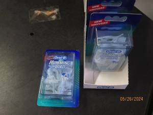 box of 4 oral B humming bird 15 flosser refills per box 60 per lot resale value $45.00 per box of 15