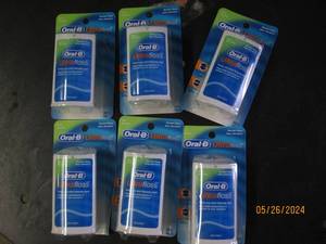 box of 6 oral B ultra floss...