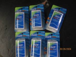 box of 6 oral B ultra floss...