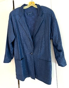lot 95 image: A Leather Rendition by Sandi Holien Skirt and Jacket Set