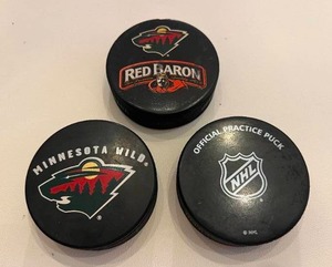 lot 18H image: 3 Minnesota Wild NHL Hockey Pucks