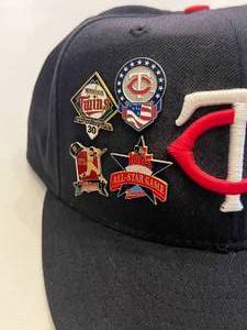 lot 41B image: Vintage Minnesota Twins Baseball Hat With Vintage Pins and Signed by Tim Laudner