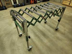 lot 9 image: General International Expanding Board Roller System with Adjustable Height Settings