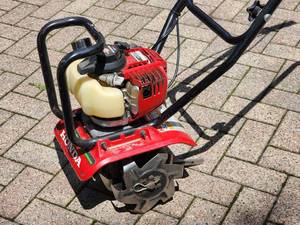 lot 25 image: Honda GX-25 4 Stroke Garden Tiller