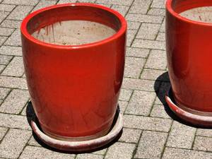 lot 147 image: (2) Heavy Duty Red Ceramic Planters