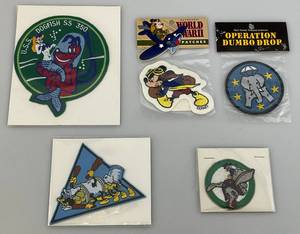 lot 61 image: Misc. Vintage Disney World War II Patches