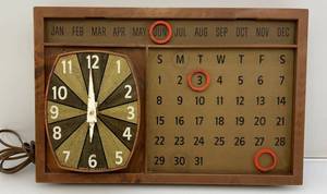 lot 112 image: Spartus Brand Mid-Century Bakelite Magnetic Calendar Wall Clock