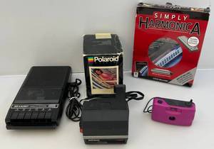 lot 187 image: Misc. Vintage Polariod Cameras & More