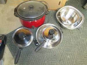 lot 36 image: Assortment of pots and pans...
