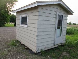 lot 02 image: Portable bunk house with shingled r...