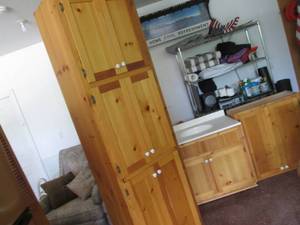 lot 12 image: Pine sink cabinet with tall side ca...