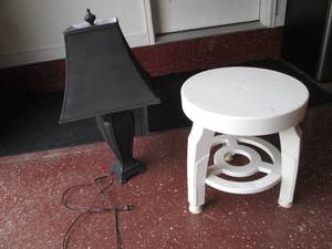 lot 15 image: Lamp and plastic swivel top table o...