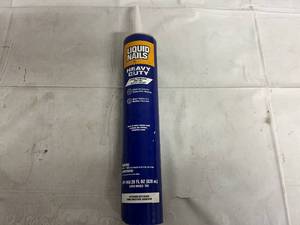 28 FL OZ Bottle of Heavy Duty Liquid Nails