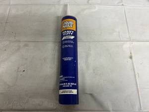 28 FL OZ Bottle of Heavy Duty Liquid Nails