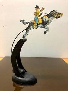 lot 17 image: Hand Painted Metal Balancing Cowboy on Horse Display