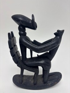 lot 47 image: Carved Wood Vintage African Masked Figural Sculpture - In the Style of Henry Moore