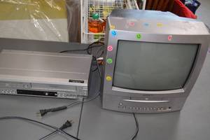 lot 6 image: Toshiba CRT TV with Built-in DVD and VCR Player