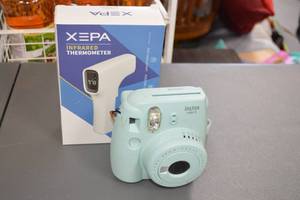 lot 8 image: Instax Mini 9 Instant Camera and Xepa Infrared Thermometer Bundle