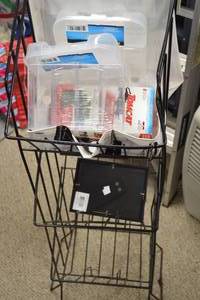 lot 167 image: Lot of Assorted Storage Bins, Tomcat Mouse Killer & Decor Items on Metal Rack