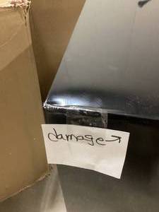 Magic Chef 4.4 cu. ft. Mini Fridge in Stainless Look Damaged    Customer Returns See Pictures