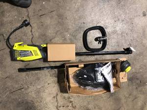 lot 10 image: RYOBI 18 in. 10 Amp Attachment Capable Electric String Trimmer  Customer Returns See Pictures