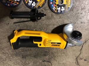 lot 14 image: DEWALT 20V MAX Cordless 4.5 in. - 5 in. Angle Grinder (Tool Only)   Customer Returns See Pictures
