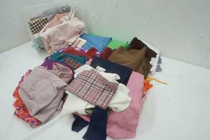 lot 4 image: Plastic Bin with a Variety of Material (length and width unknown)