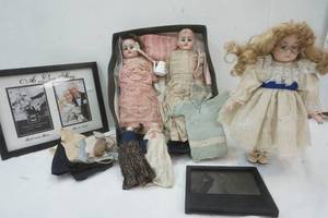 lot 35 image: Vintage Dolls, two picture frames