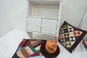 lot 44 image: Wicker Bathroom Cabinet, Quilted Pillow, Quilt Pillow case, Ceramic Pumpkin
