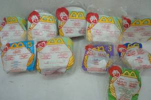 lot 55 image: Mulan and Aladdin McDonalds Happy Meal toys
