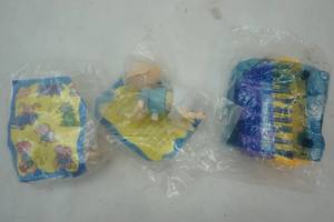 lot 58 image: 1998 Rugrats toys, Elizas card caddy and baby crawling