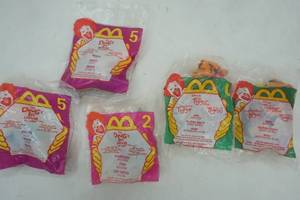 lot 63 image: Dougs First Movie 1999 Happy Meal McDonalds and Tigger 2000 toys