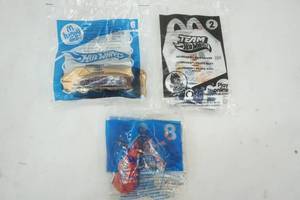 lot 72 image: 2008, 2012 Hot Wheels McDonald Happy Meal Toys