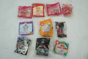 lot 79 image: 2002, 2009 McDonald Happy Meal Toys, Strawberry Shortcake, Battle Force, Tiger, Star Wars