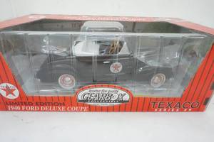 lot 231 image: New Cast Iron Texaco 1940 Ford Deluxe Coupe Chain Driven Pedal Car