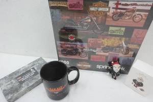 lot 307 image: Harley Davidson Puzzle, Ornament, Mug and VHS Video