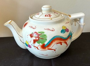 lot 53 image: Two Asian Teapots with Eight Petite Teacups