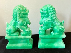 lot 58 image: Pair of Faux Jade Foo Dog Figurines