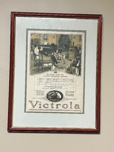 lot 28 image: Framed Victrola Music Magazine Clipping & Antique Victrola